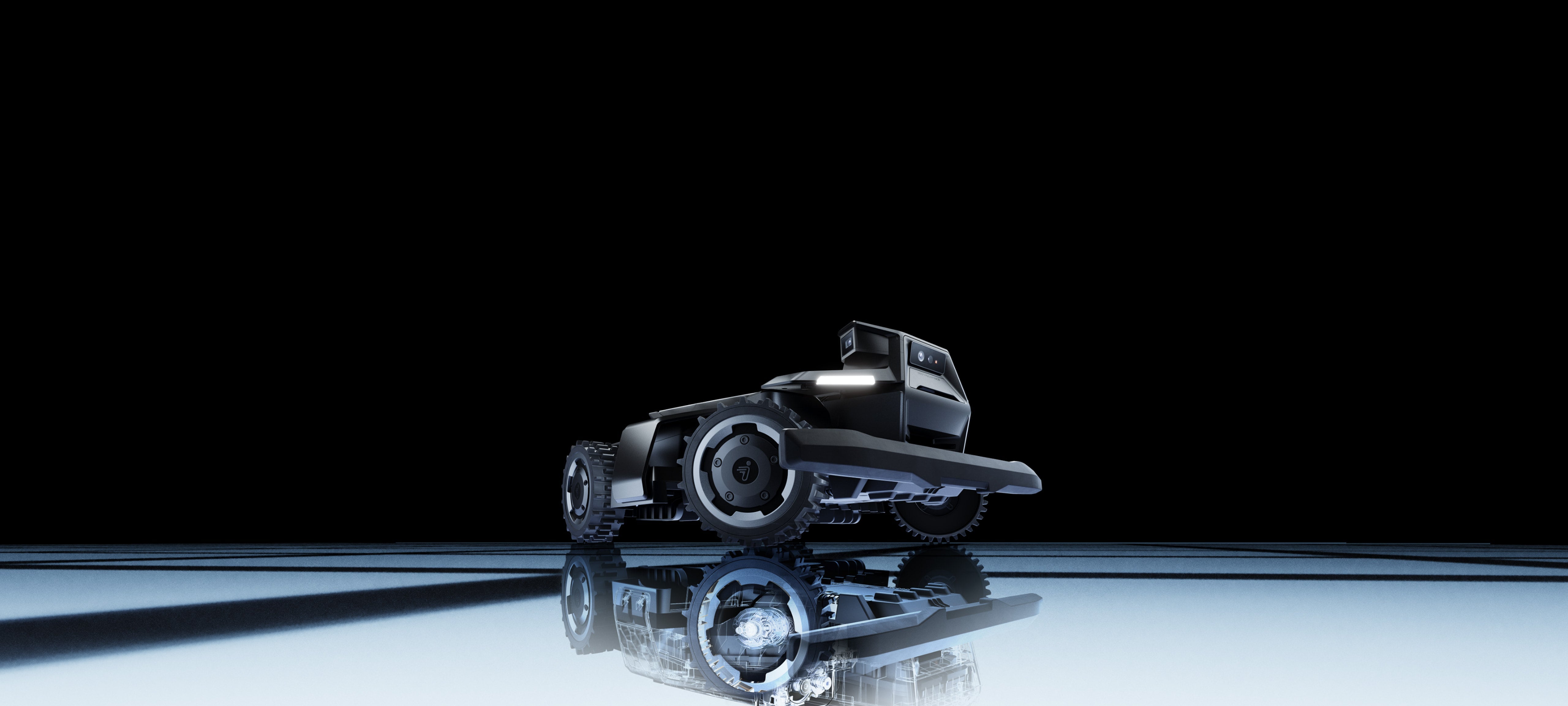 Segway Navimow i Series robot lawn mower reflects on ground.