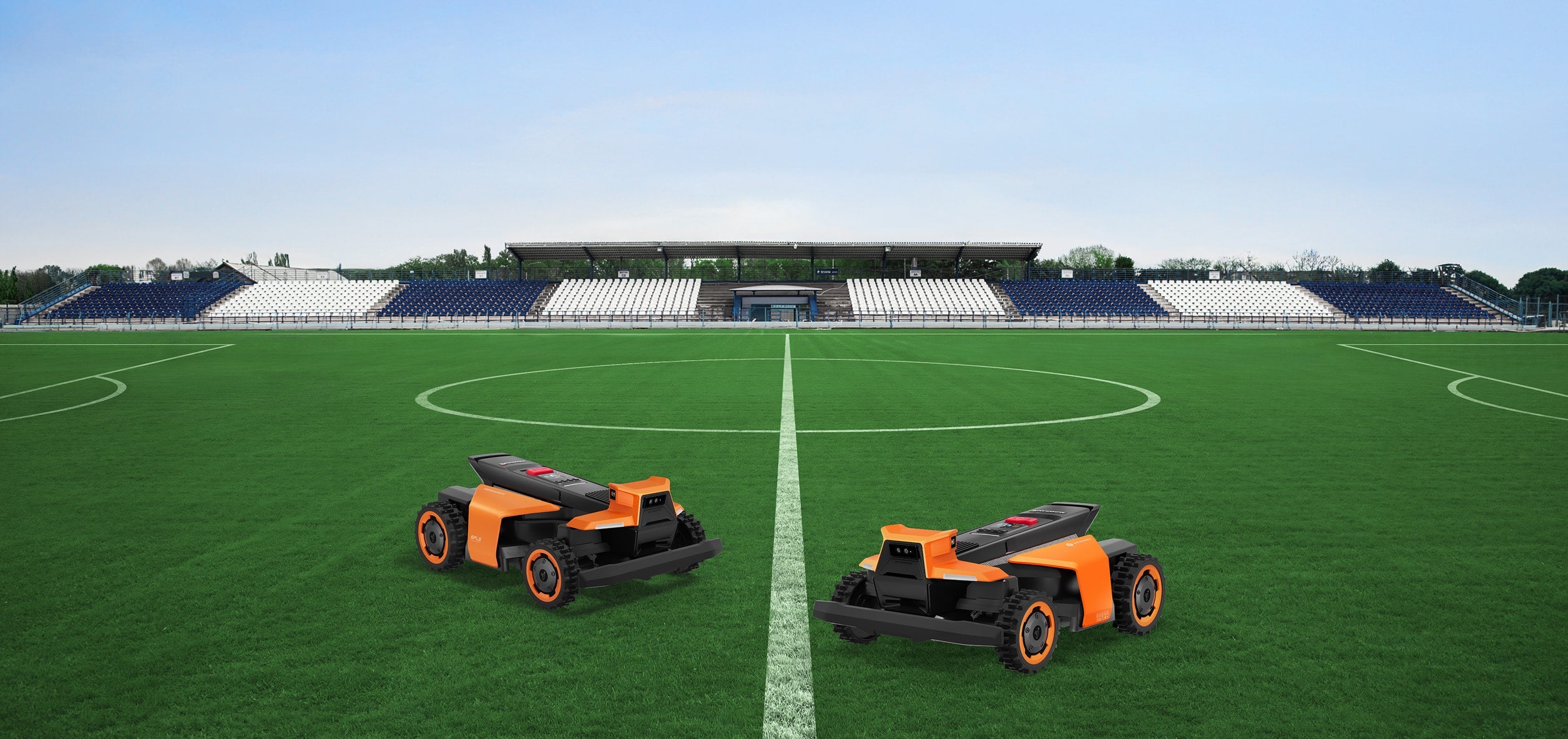 Navimow i Series robot lawn mower on a soccer field.