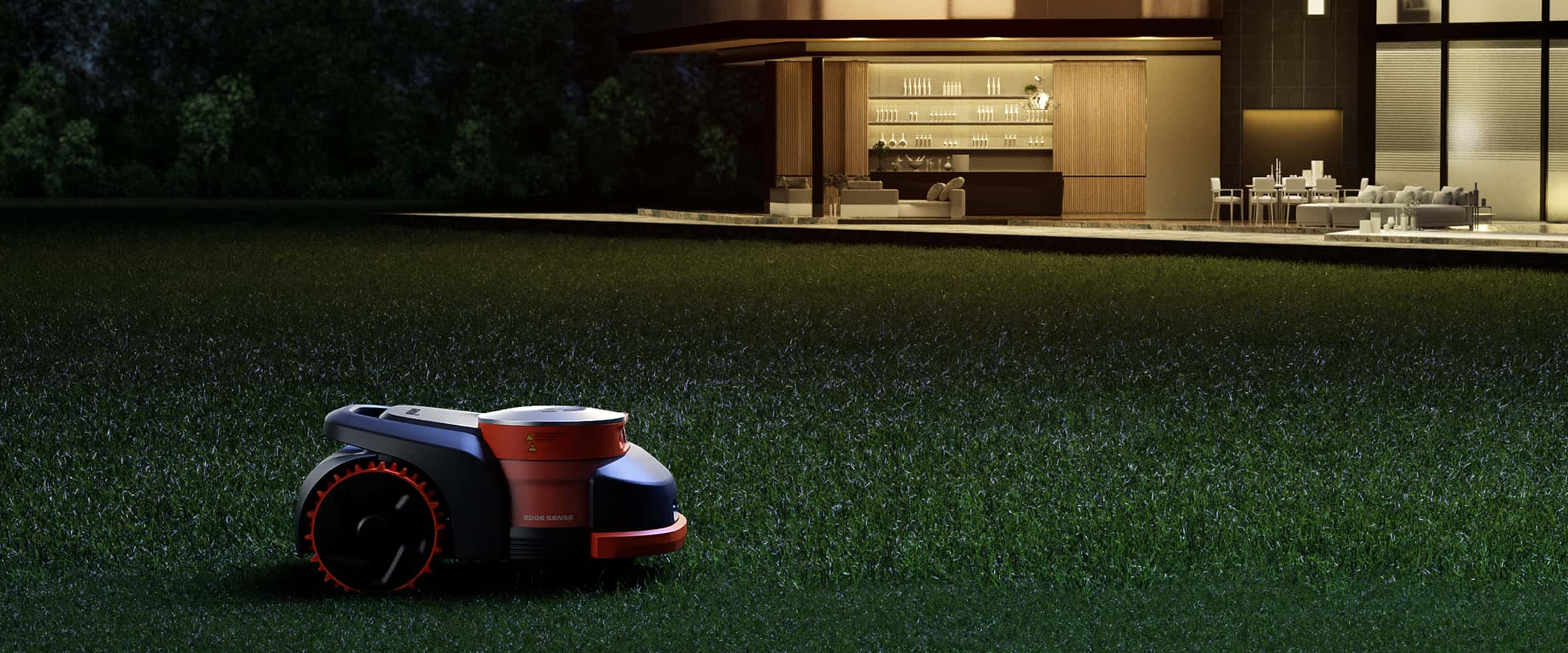Navimow i105E robot lawn mower mows the grass at night.