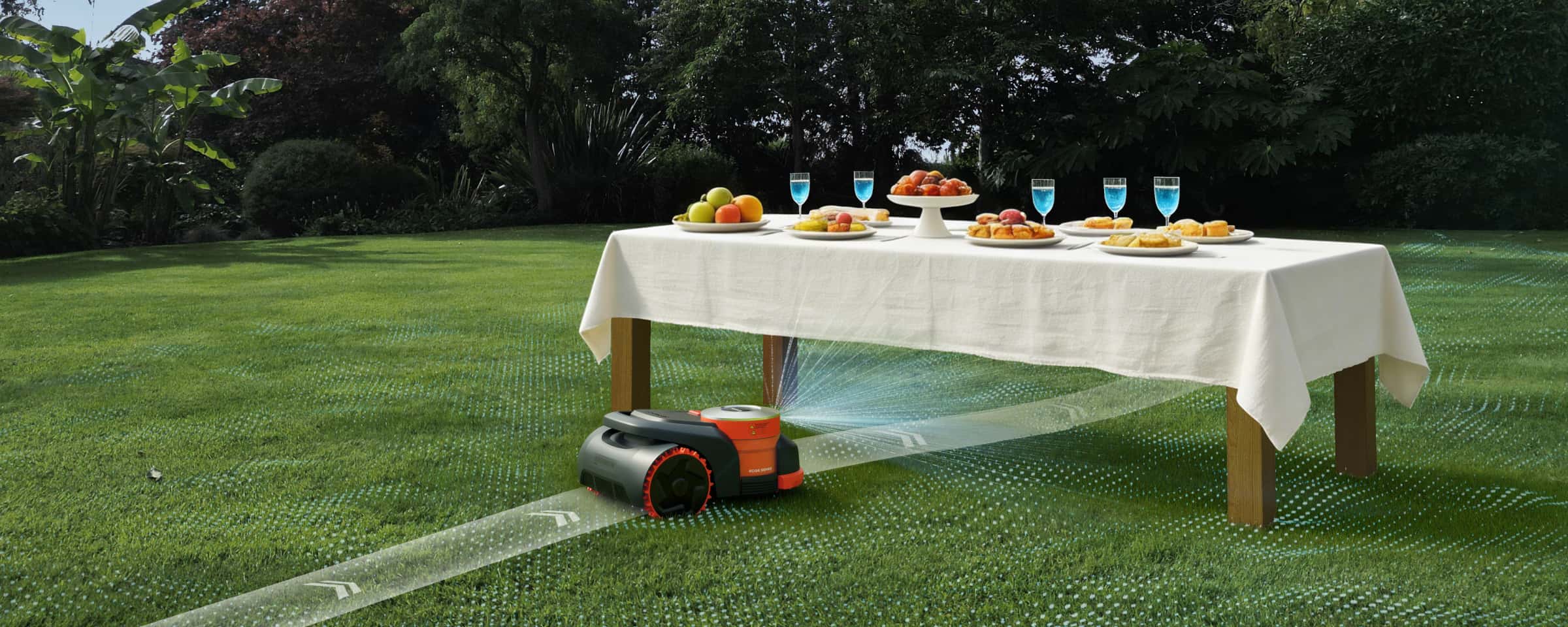 Navimow i Series robot lawn mower under the garden table