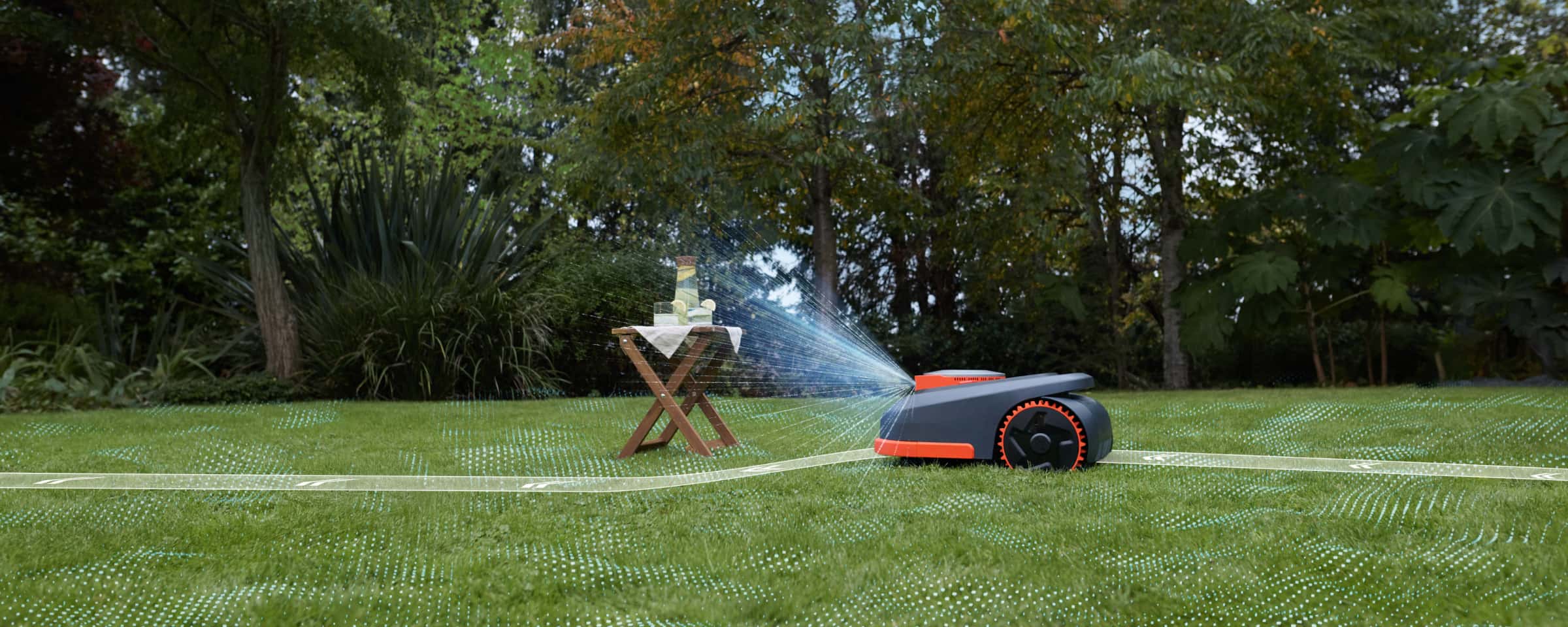 Segway Navimow i110N robot lawn mower mows the green grass.