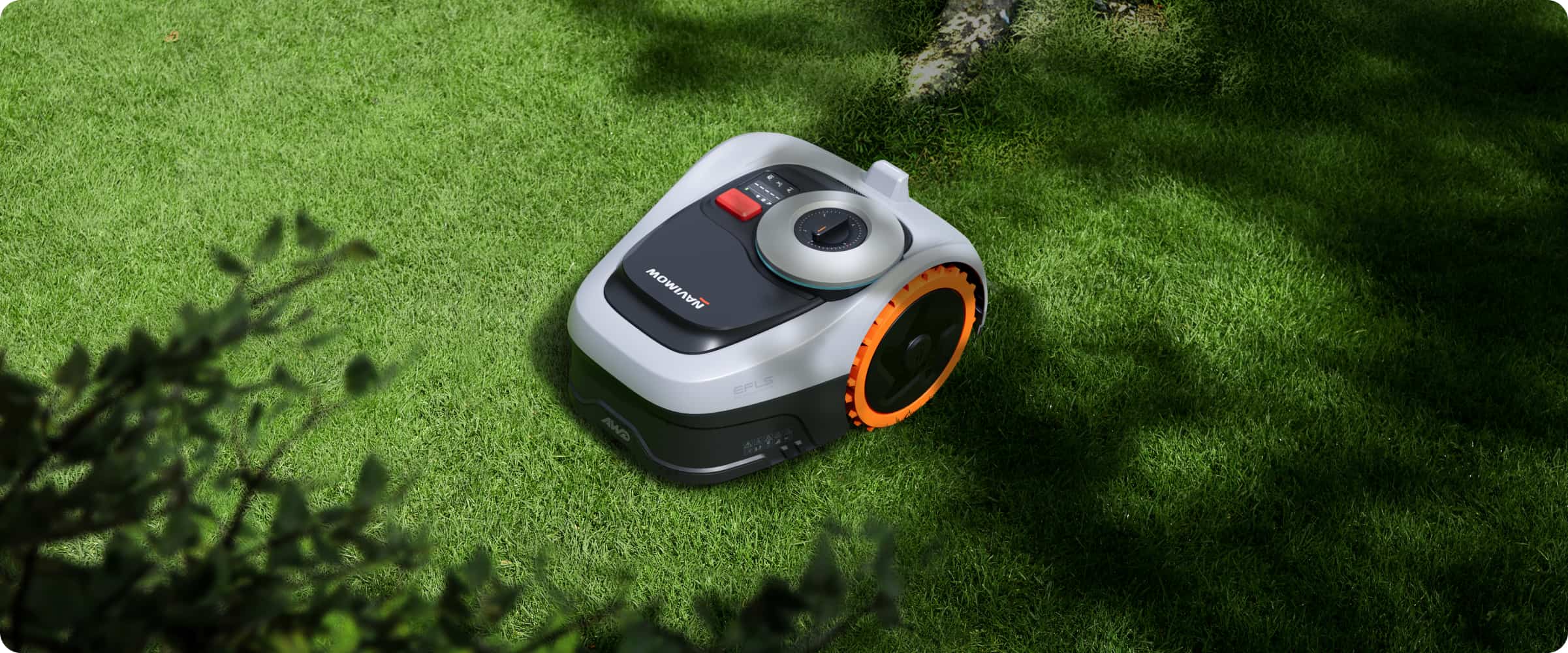 Navimow X3 AWD robot lawn mower on a green lawn.