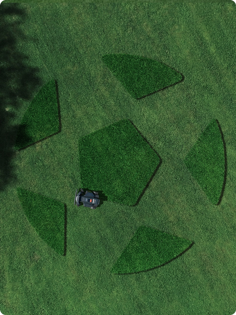Navimow i110E robot lawn mower mows a grass soccer ball.