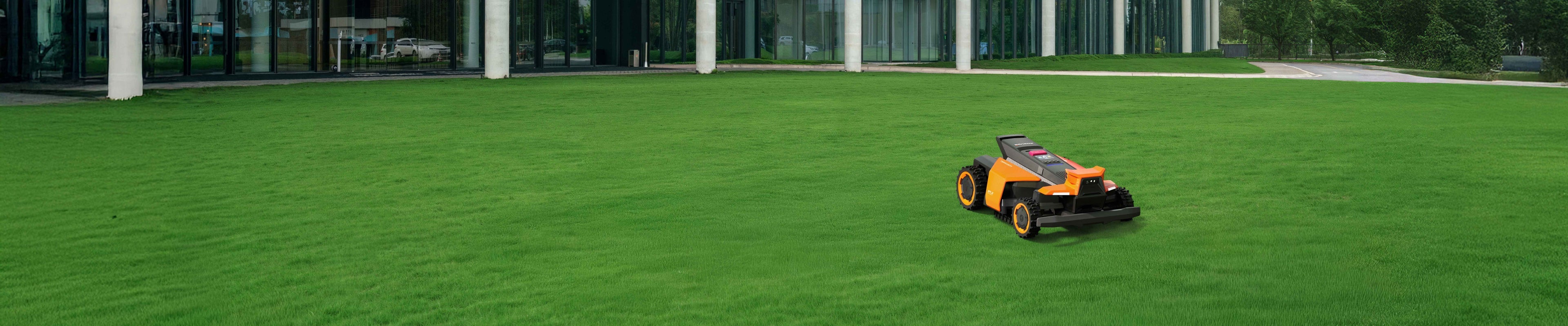 Navimow i110N robot lawn mower is on the green grass.