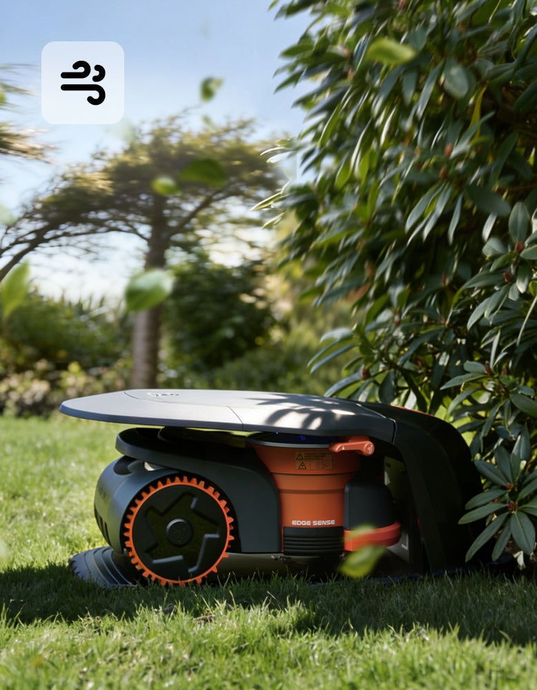 Navimow i105E robot lawn mower parked in a green garden.