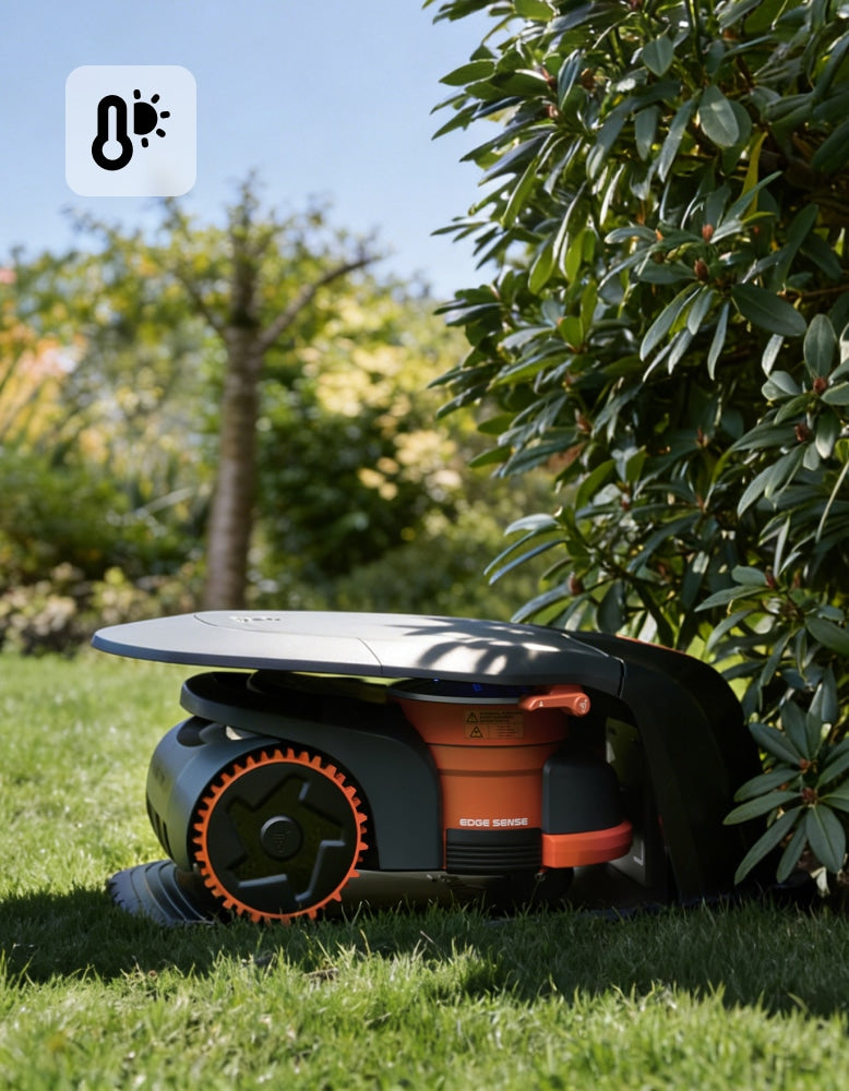 Navimow i110N robot lawn mower is parked under a bush.