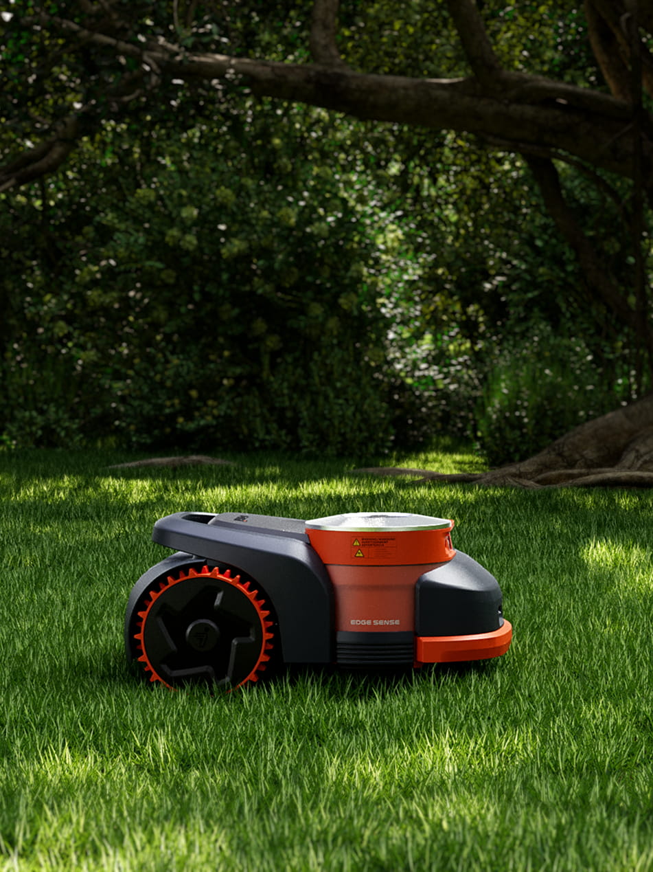 Navimow i110N robot lawn mower on a bright green lawn.