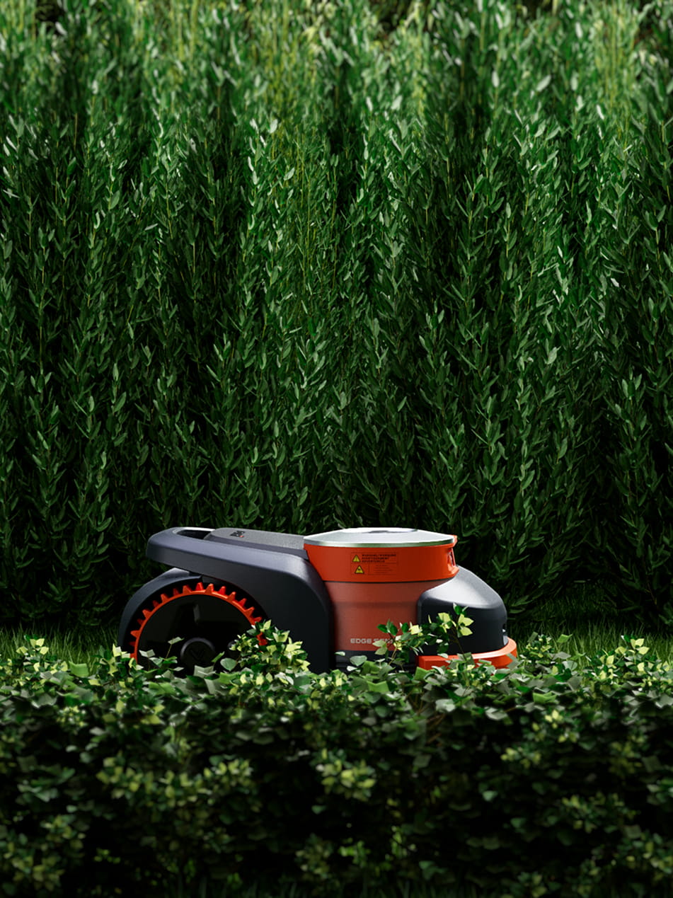 Navimow i110N robot lawn mower is working in the garden.
