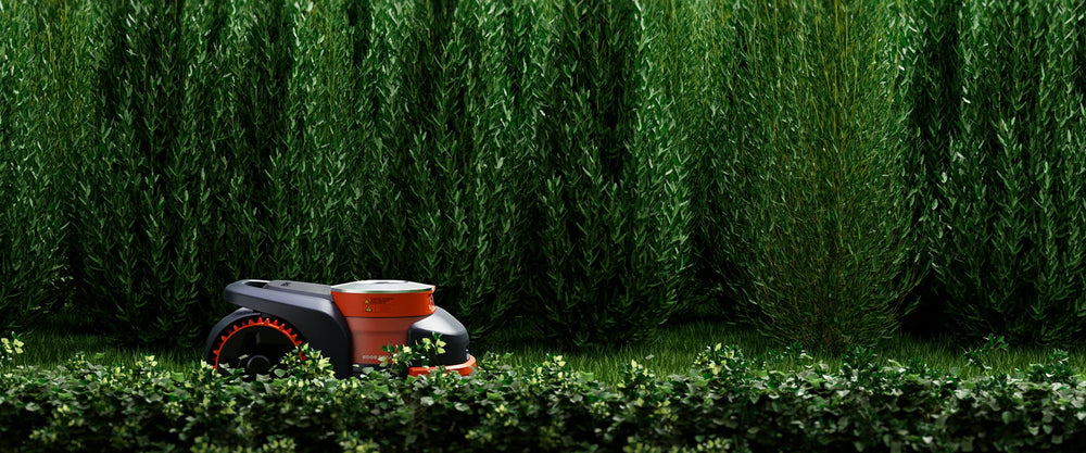 Navimow i Series robot lawn mower in a green garden.