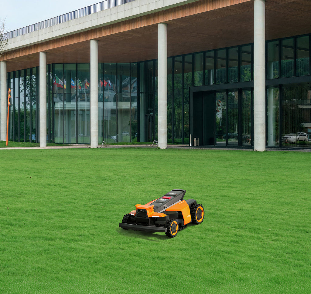 Segway Navimow i110E robot lawn mower on a green lawn.