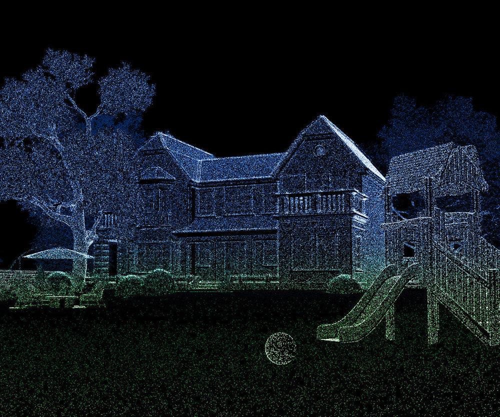 Segway Navimow i110N robot lawn mower in a backyard scene.