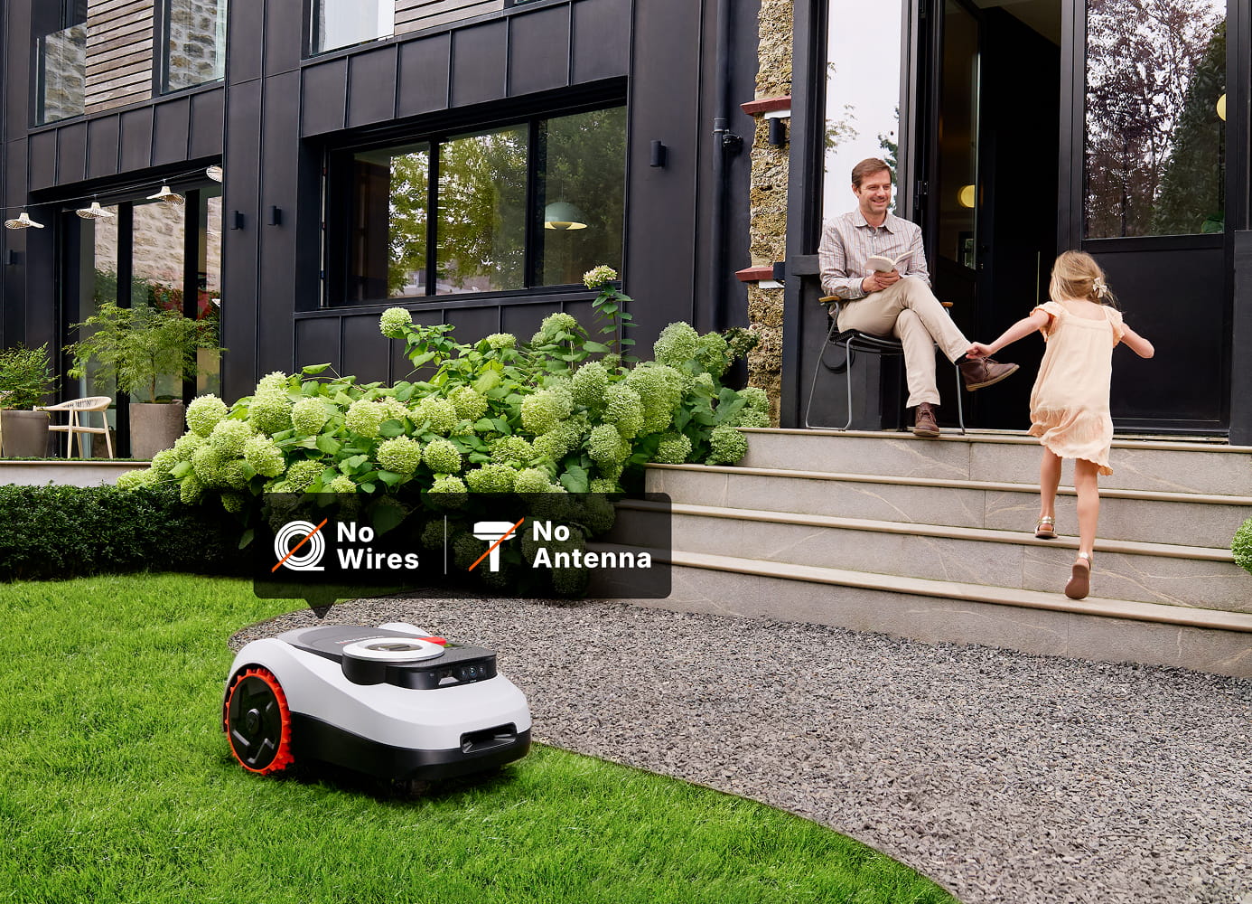 Segway Navimow i110E robot lawn mower cuts the green grass.