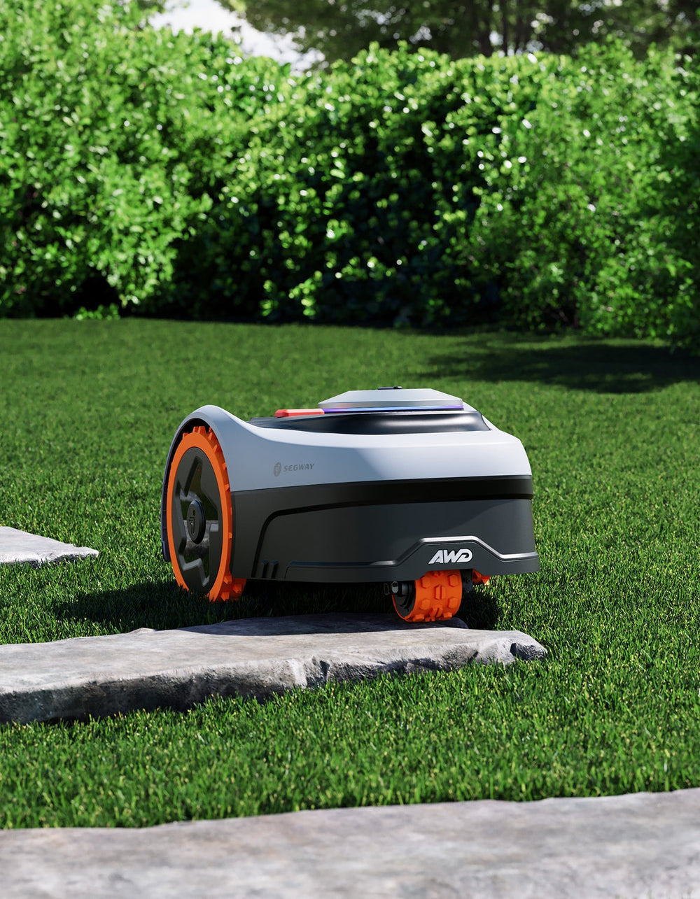 Segway Navimow X3 robot lawn mower sitting on the grass.