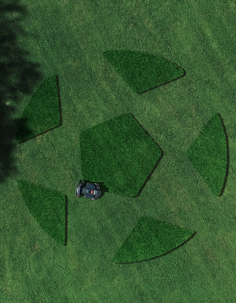 Navimow i110E robot lawn mower cuts soccer ball grass pattern.